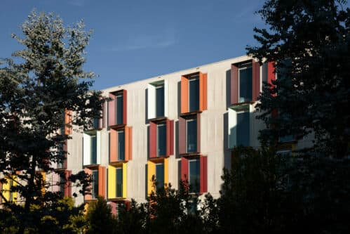 Residents socialising in a co-living community lounge