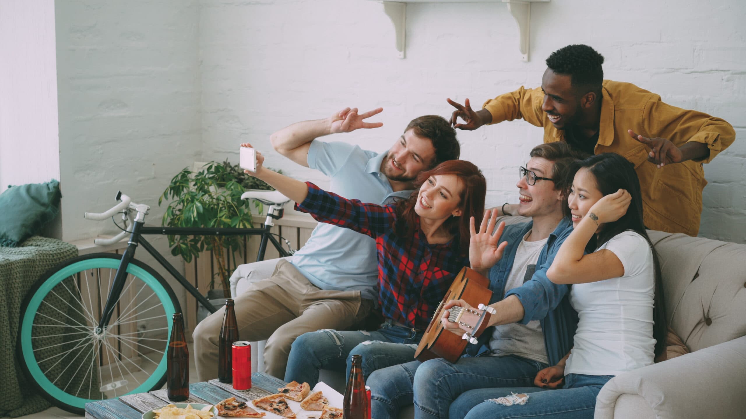 Residents socialising in a co-living community shared space